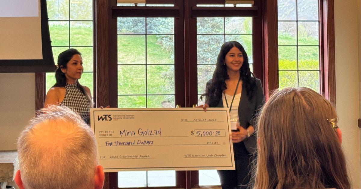 Mina Golazad receiving her scholarship
